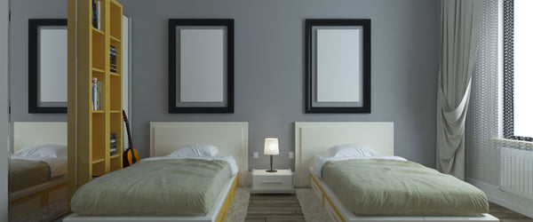 Grey bedroom with two twin-size beds