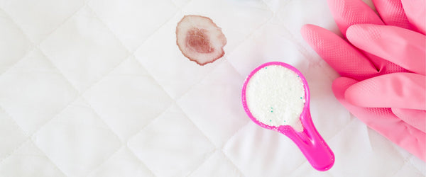 Gloves and detergent for cleaning a blood stain on a mattress