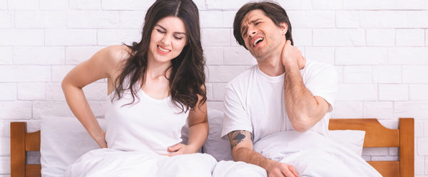 Man waking up with neck pain
