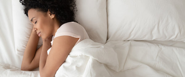 Woman sleeping on side