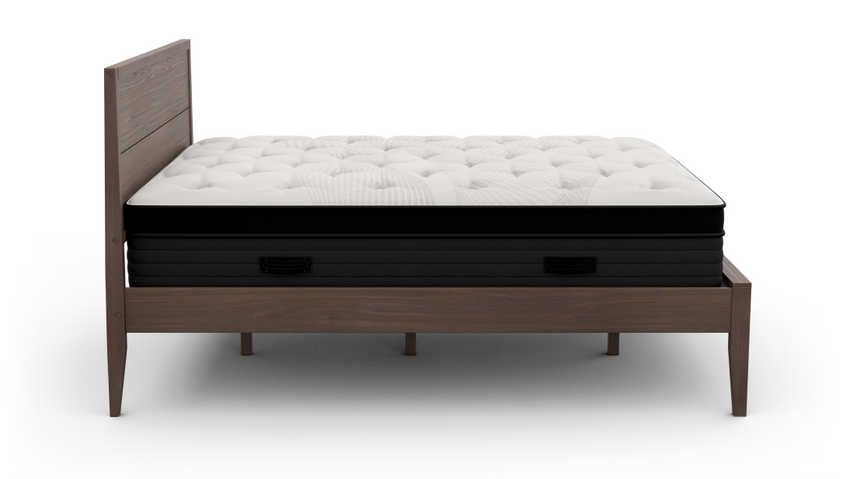 Walnut finish platform bed frame with headboard, seen with a Nolah mattress